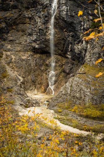 Autum framed waterfall in the Karwendel Alps of Austria