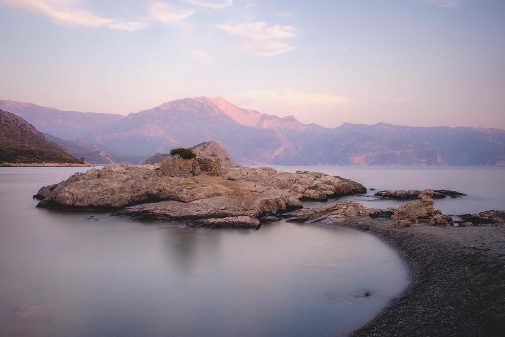A small island with an old temple at sunrise, Turkey